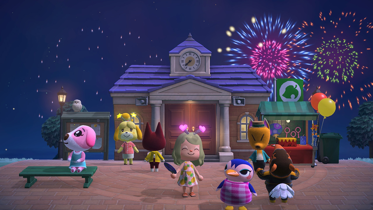 Villagers gather outside the town hall under a night sky full of fireworks